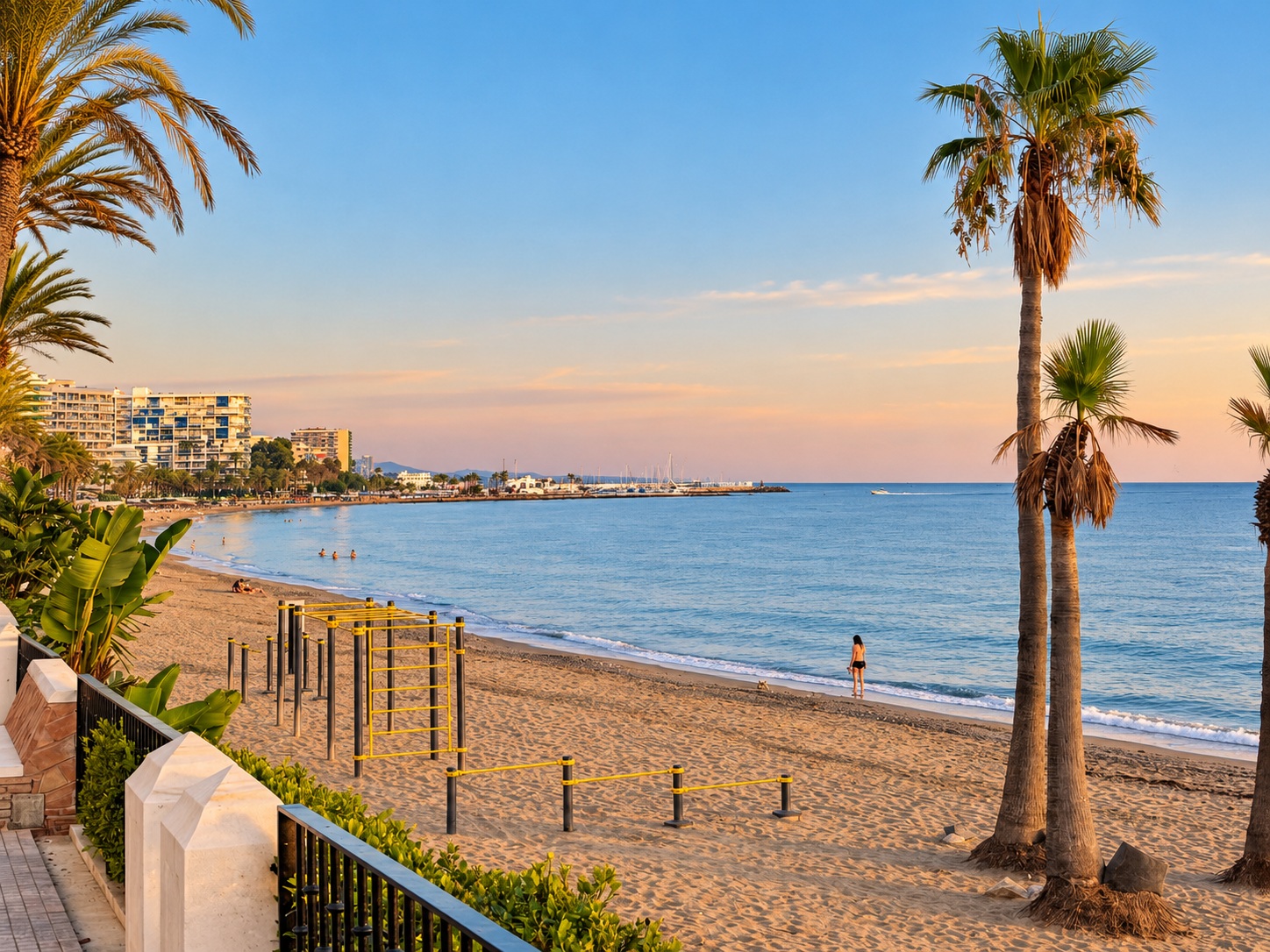 Marbella beachfront with palm trees and the Mediterranean Sea