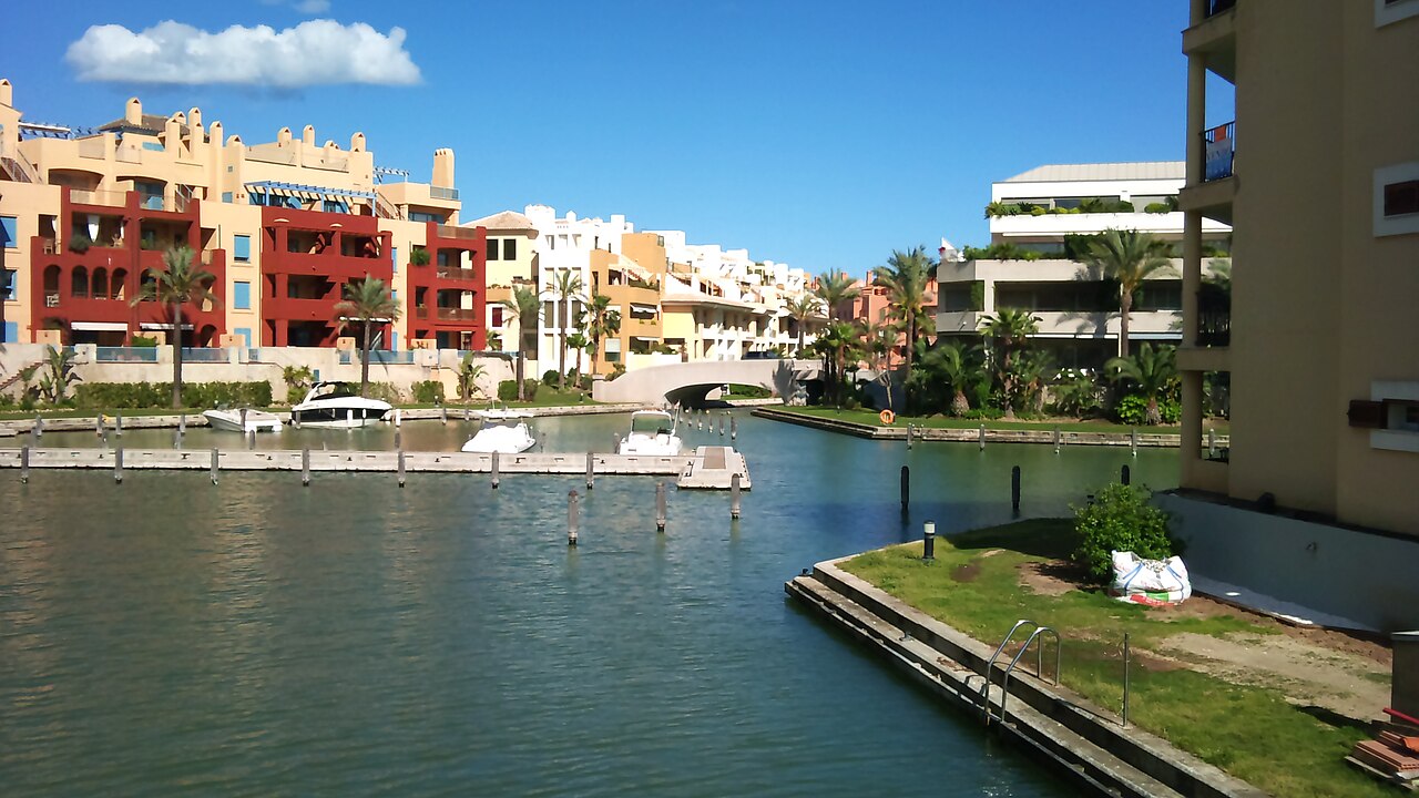 Sotogrande marina with waterfront homes and boats